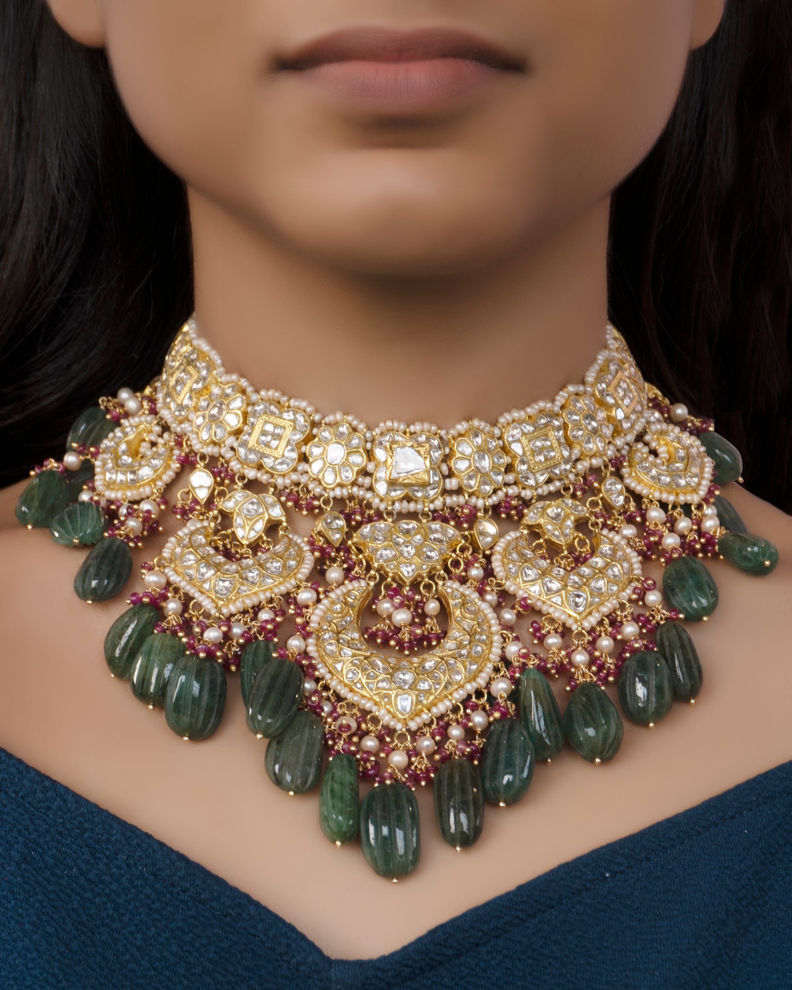 Neeliya Necklace and Kashish Chandbalis Polki Set