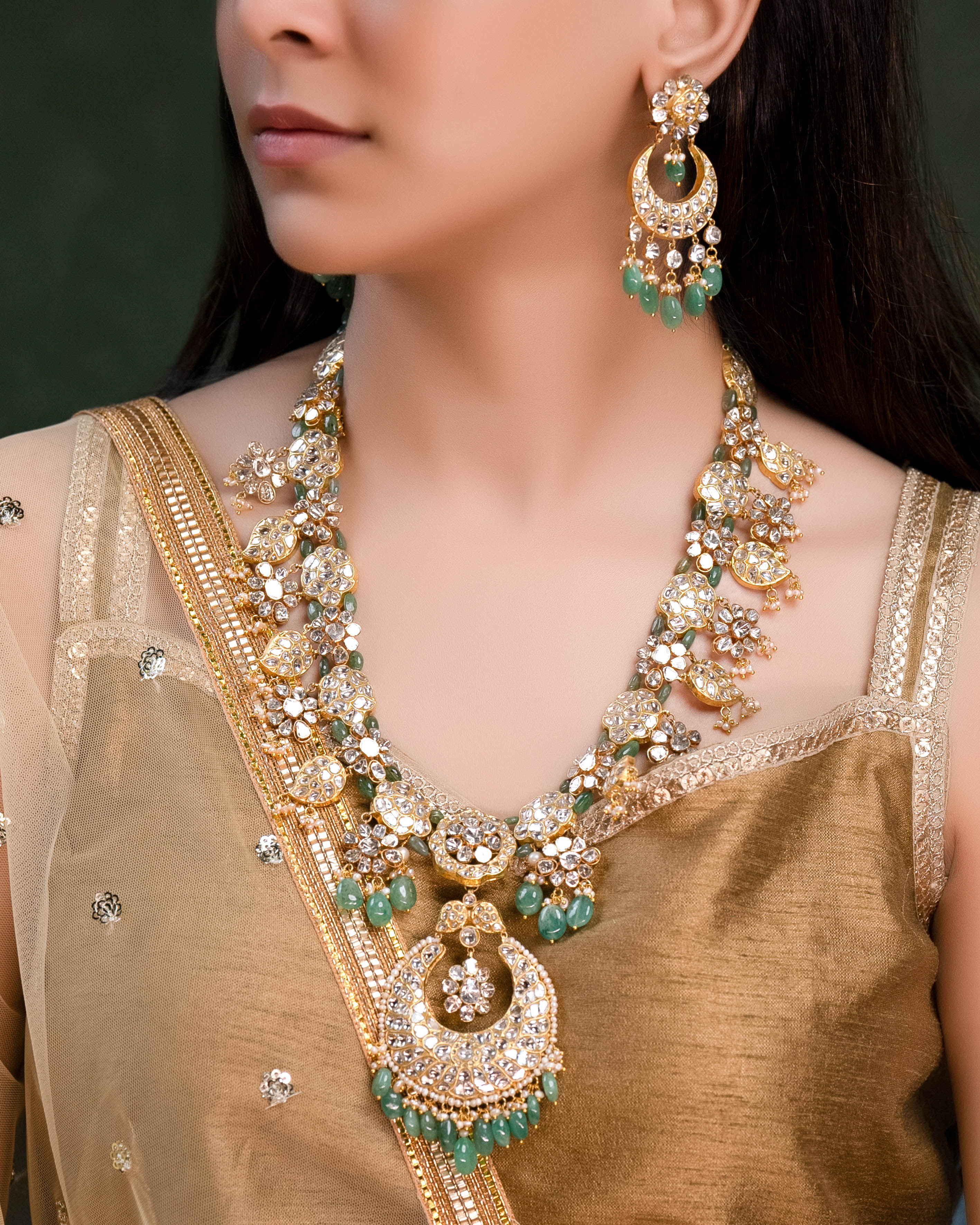 Adhira Long Necklace And Ishani Chandbalis Polki Set
