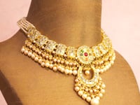 Vrutika Necklace And Krisha Chandbalis Polki Set