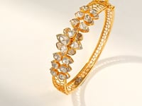 Raksha Polki And Diamond Bangle