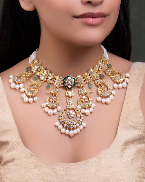 Mrunali Necklace And Aadhira Chandbalis Polki Set